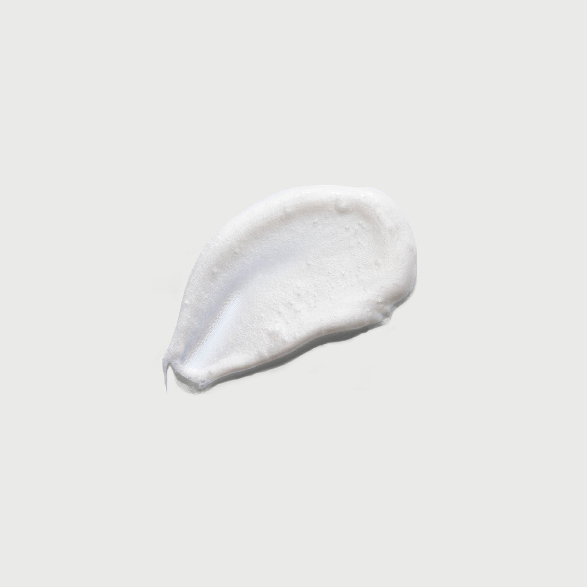 the-smoother-glycolic-acid-exfoliating-body-wash-i9 NATR-40002-Swatch-The-Smoother-Glycolic-Acid-Exfoliating-Body-Wash-bonebkgd.jpg