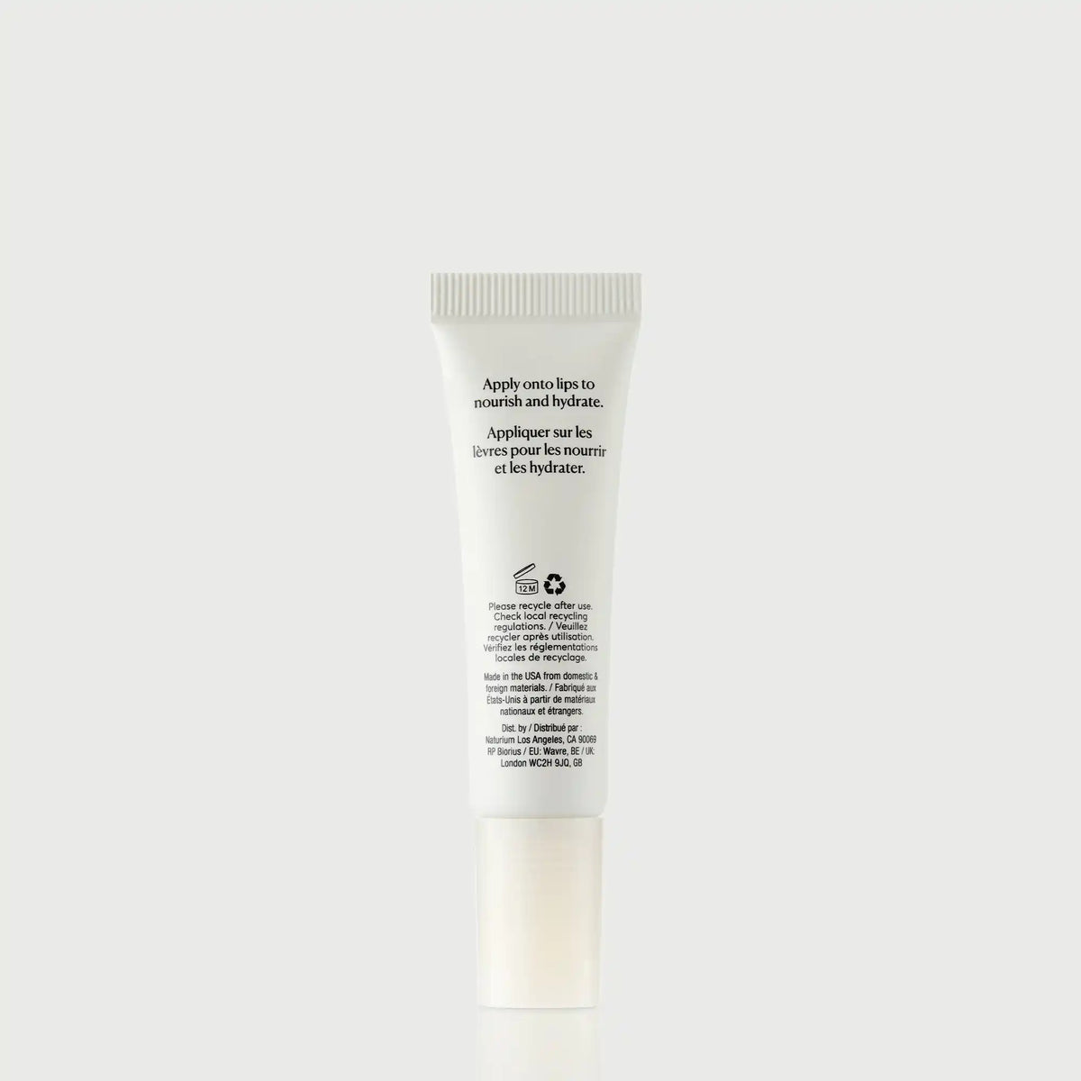 phyto-glow-lip-balm-clear-o1 NATR-60066_PhytoGlow_Clear_primary_capon_back-bonebkgd.webp